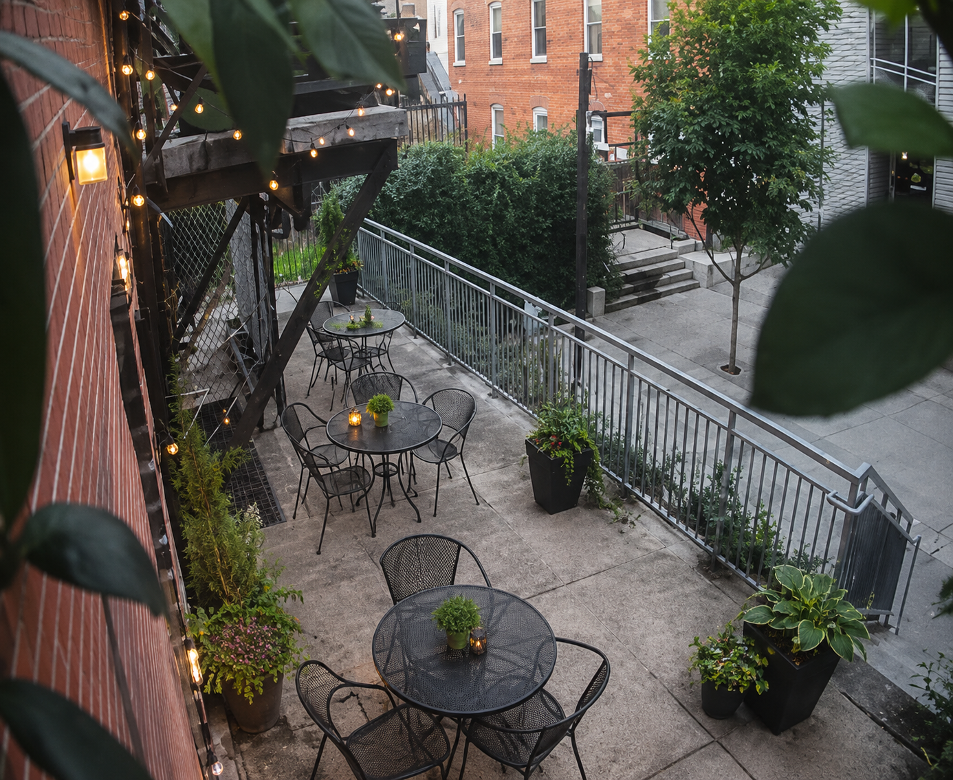 Concept showing café tables, chairs, planters, and lighting on the future Tunnel Market rear patio